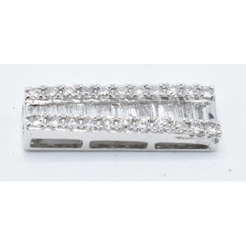 453 - 18ct white gold bar pendant set with approximately 0.8ct of diamond. 21mm.