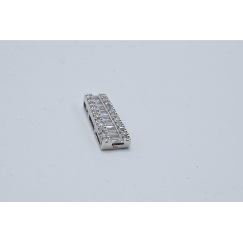 453 - 18ct white gold bar pendant set with approximately 0.8ct of diamond. 21mm.