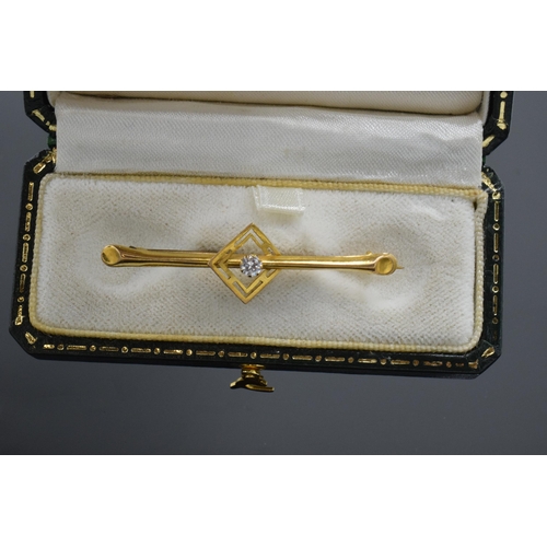 457 - 9ct hallmarked gold & diamond set brooch.  Weight 1.3g, 45 mm wide.