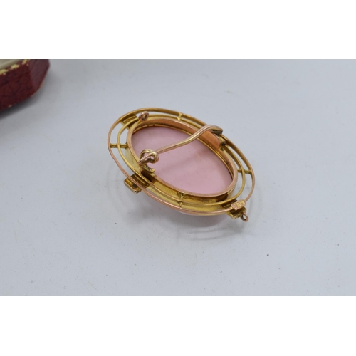 466 - 9ct gold pink carved coral cameo brooch set seed pearls, weight 6.9g, 35mm high.