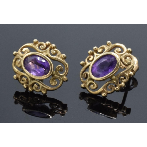 472 - 9ct gold and amethyst earrings