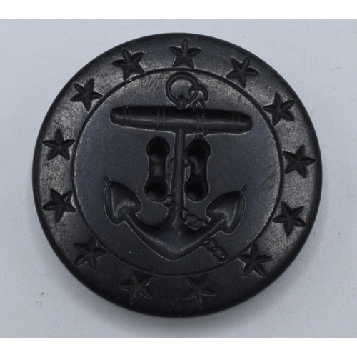 479 - Jet or similar material 19th century large naval military button, 35mm wide.