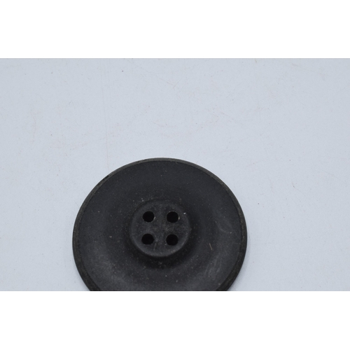 479 - Jet or similar material 19th century large naval military button, 35mm wide.