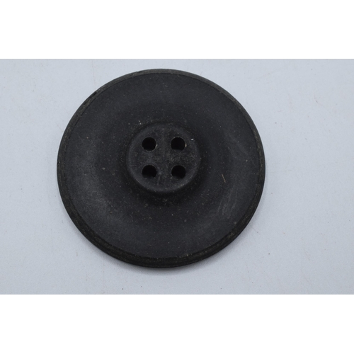 479 - Jet or similar material 19th century large naval military button, 35mm wide.