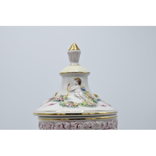 47A - A pair of pottery items to include Franklin Mint figurine Cinderella and an R Capodimonte lidded urn... 