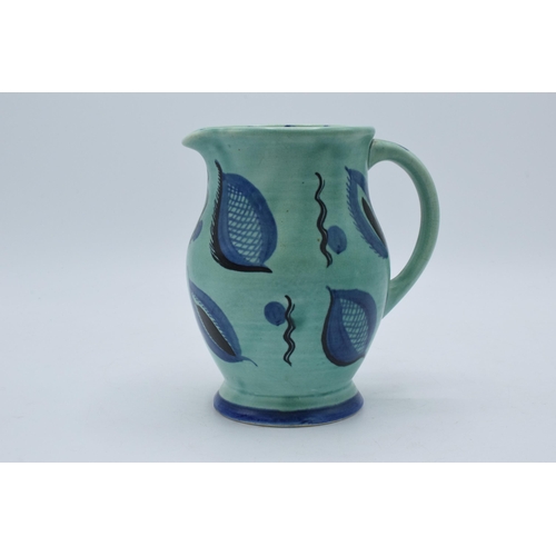 47D - A Susie Cooper blue and green mottled glaze shouldered jug with stylised decoration, 16cm tall.