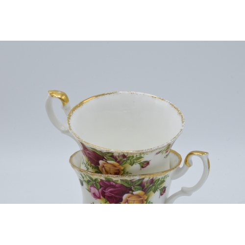 47H - A collection of Royal Albert Old Country Roses items to include 4 cups and 4 breakfast plate saucers... 