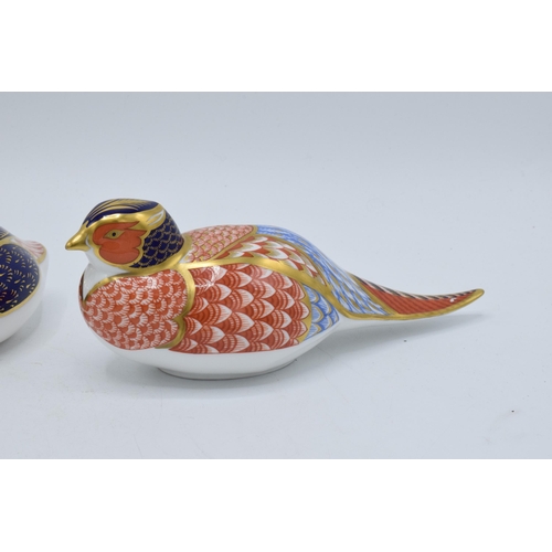 49 - A trio of Royal Crown Derby paperweights to include a pheasant, a bird and an Angel Fish (3). All wi... 