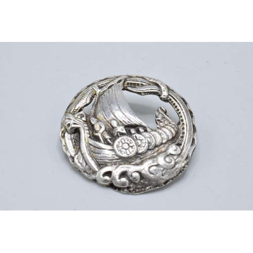 490 - A hallmarked silver brooch with a Viking galleon, Edinburgh 1961 by Robert Allison. 19.2 grams. 40mm... 