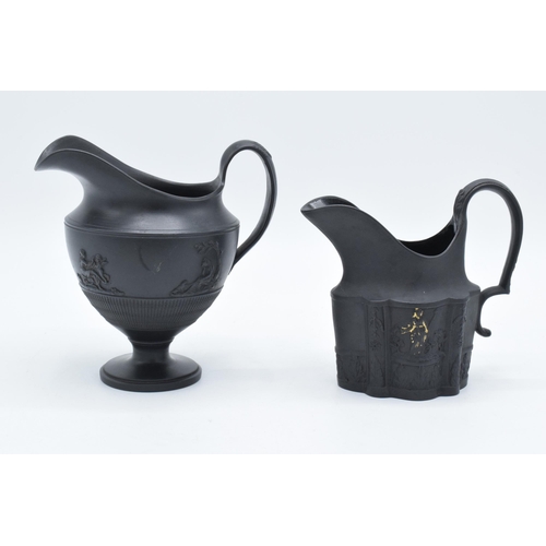 87 - 19th century black basalt cream jug with gilded relief decoration and tall pedestal jug with figural... 