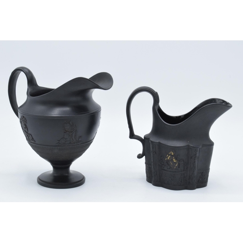 87 - 19th century black basalt cream jug with gilded relief decoration and tall pedestal jug with figural... 