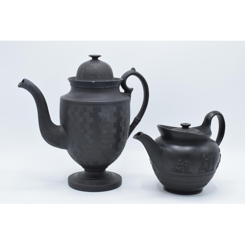 93 - A late 18th century / early 19th century, circa 1800, black basalt coffee pot and cover with engine-... 