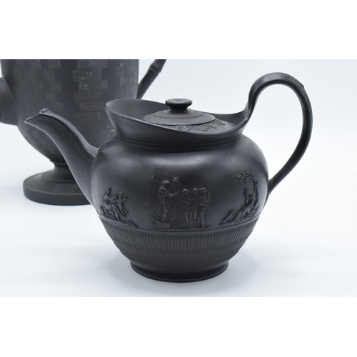 93 - A late 18th century / early 19th century, circa 1800, black basalt coffee pot and cover with engine-... 