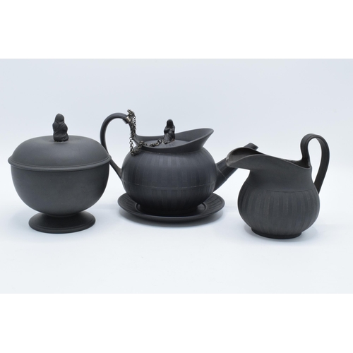 97 - A collection of early 19th century Wedgwood black basalt comprising a globular teapot and cover, a j... 