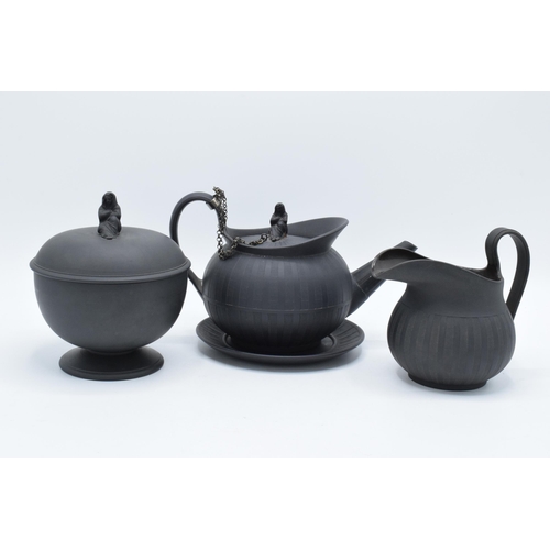 97 - A collection of early 19th century Wedgwood black basalt comprising a globular teapot and cover, a j... 