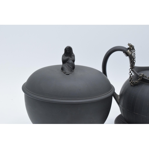 97 - A collection of early 19th century Wedgwood black basalt comprising a globular teapot and cover, a j... 