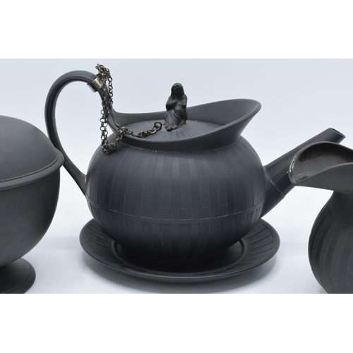 97 - A collection of early 19th century Wedgwood black basalt comprising a globular teapot and cover, a j... 