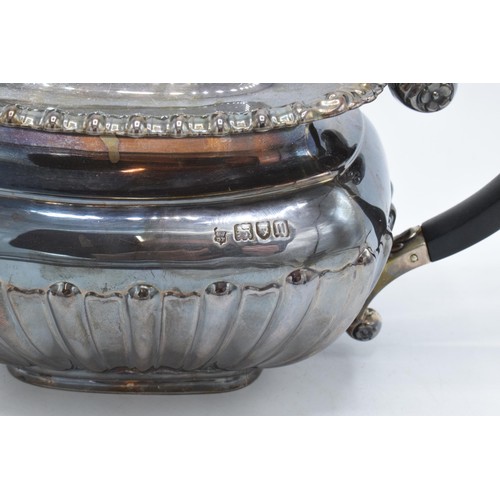 369 - Silver tea pot together with matched silver plated sugar and cream. Teapot weighs 598.8g, bearing Lo... 