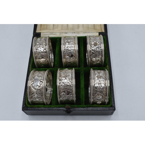 390B - A cased set of 6 silver napkin rings, Sheffield 1903. 177.9 grams.