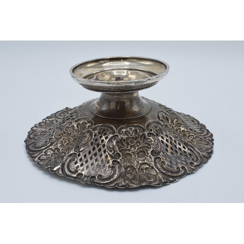 400B - A silver pedestal dish with repousse decoration, Chester 1902, 272.2 grams. 23cm wide.