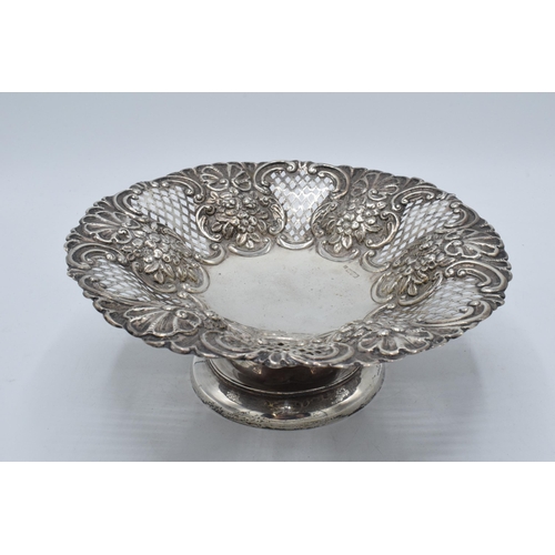 400B - A silver pedestal dish with repousse decoration, Chester 1902, 272.2 grams. 23cm wide.