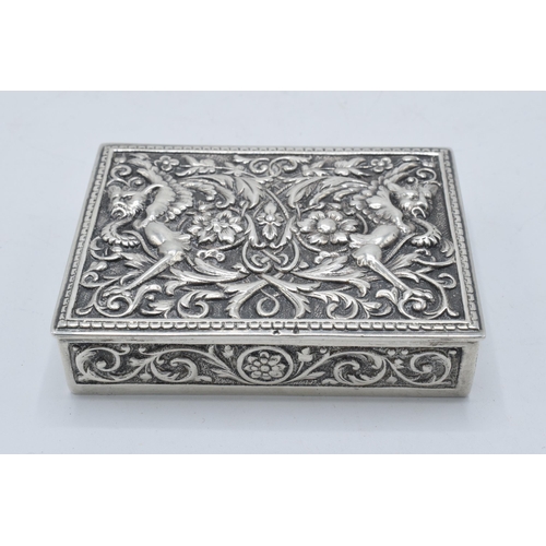 400D - A continental silver ornate repousse antique box, 152.5 grams. 8.5 x 6.5cm.