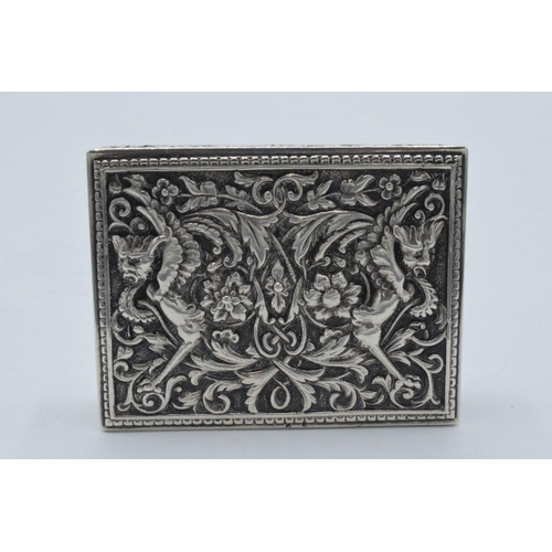 400D - A continental silver ornate repousse antique box, 152.5 grams. 8.5 x 6.5cm.