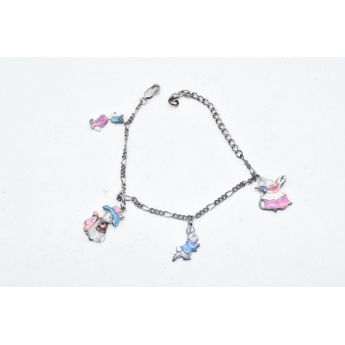 497 - A bracelet with silver enamelled Beatrix Potter figures, 20cm long