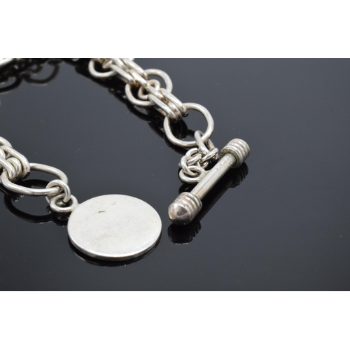 498 - A sterling silver (marked 925) link bracelet with T-bar, 31.3 grams. 23cm long.