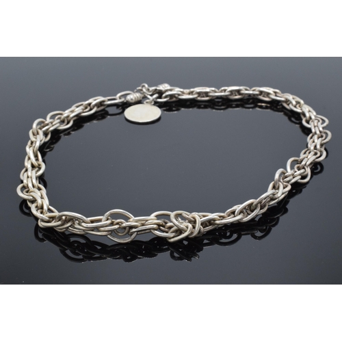 499 - A sterling silver (marked 925) link chain with T bar, in the style of an Albert watch chain. 95.4 gr... 