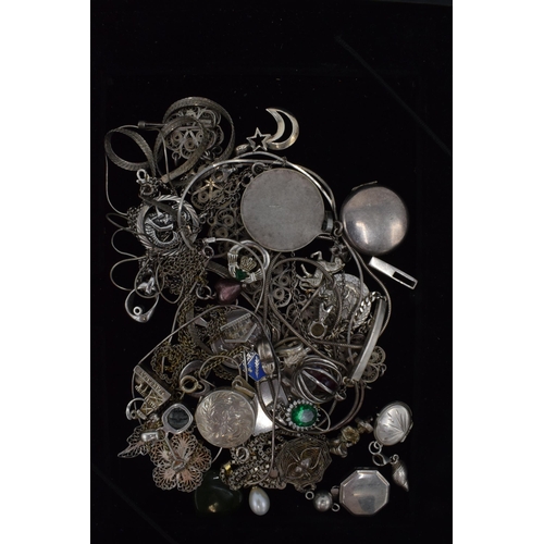 504 - A collection of mainly silver jewellery to include chains, charms, pendants to include St. Christoph... 