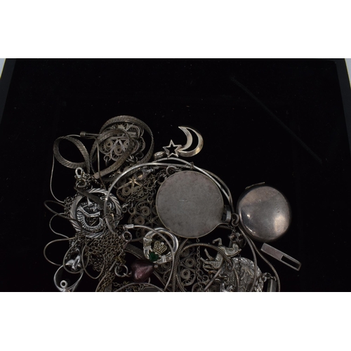 504 - A collection of mainly silver jewellery to include chains, charms, pendants to include St. Christoph... 