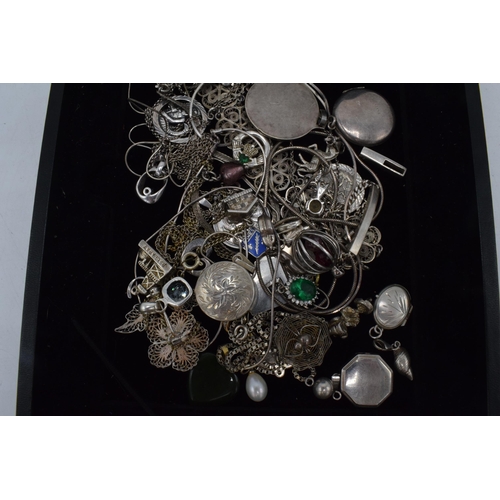 504 - A collection of mainly silver jewellery to include chains, charms, pendants to include St. Christoph... 