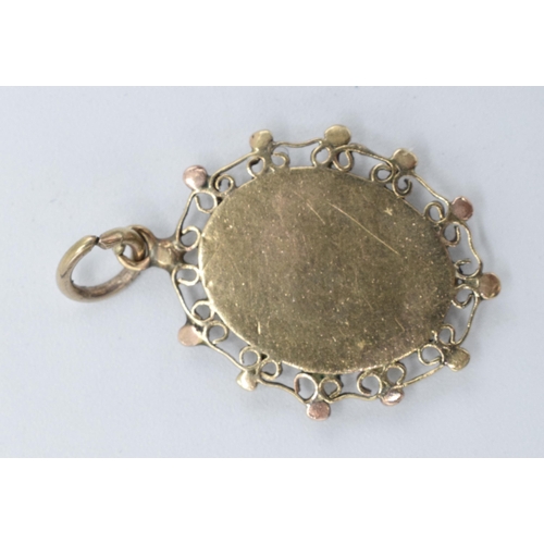 506 - A late 19th century miniature pendant in 9ct gold frame, 1.6 grams. 25mm.