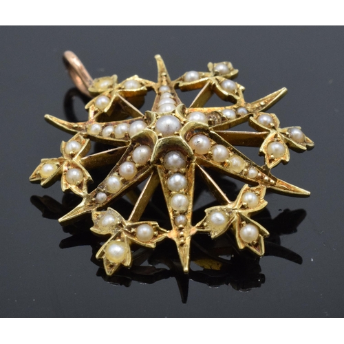 512 - 15ct gold seed pearl star pendant, 4.1 grams.