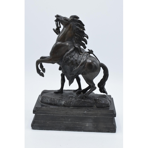 252 - A late 19th century / early 20th century pair of bronze Marley Horses, Africa and Europa with each b... 