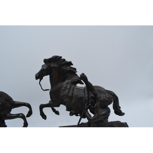 252 - A late 19th century / early 20th century pair of bronze Marley Horses, Africa and Europa with each b... 