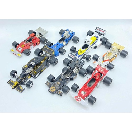 211 - A collection of Polistil and Burango Formula 1 car models to include Ferrari B3, Tyrell F1, Lotus 97... 