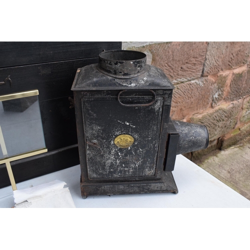 295 - A cased Negretti and Zambra magic lantern in wooden box with a box of slides with examples such as M... 