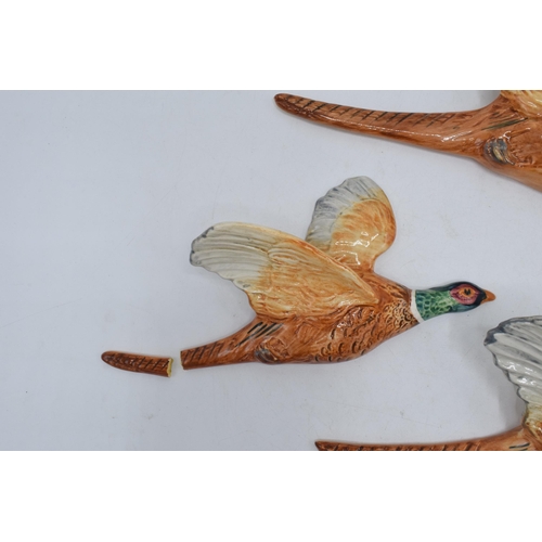 152 - A trio of Beswick pheasant wall plaques to include 661-1, 661-2 and 661-3 (3) (some damages).