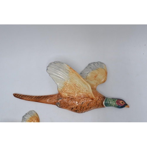 152 - A trio of Beswick pheasant wall plaques to include 661-1, 661-2 and 661-3 (3) (some damages).