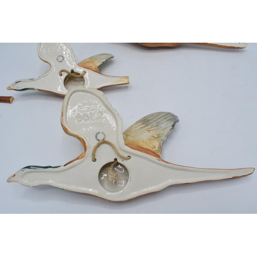 152 - A trio of Beswick pheasant wall plaques to include 661-1, 661-2 and 661-3 (3) (some damages).