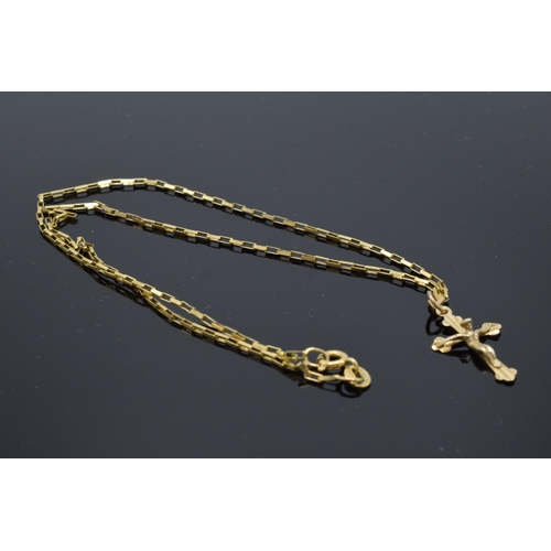 232 - 9ct gold crucifix on 9ct gold chain, 2.3 grams. Chain 41cm long.