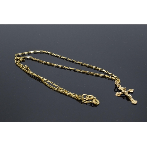 232 - 9ct gold crucifix on 9ct gold chain, 2.3 grams. Chain 41cm long.