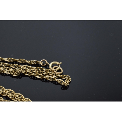 233 - 9ct gold chain with gold plated clasp, 7.2 grams total weight, approximately 65cm long.