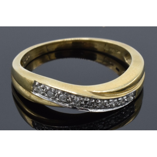 243 - 9ct gold ladies ring set with illusion-set diamonds, 2.7 grams, size P.