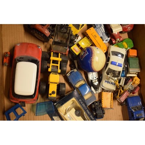 249 - A mixed collection of toys to include a Dinky Toys Chieftain Tank, Britains Ford 8730, Corgi Massey ... 