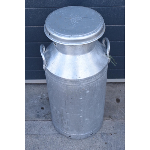 272 - A vintage aluminium milk churn made by Swiftcan for the Milk Marketing Board, 75cm tall.