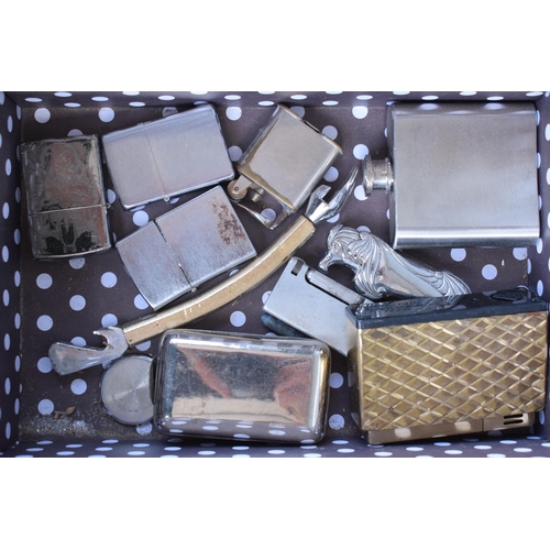 276 - A collection of vintage lighters to include a Zippo example and others (all untested).