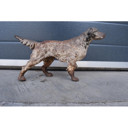 277 - A vintage cast metal retriever dog figure, 35cm long.